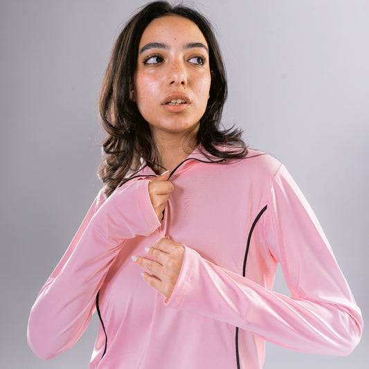 Meryia RASM blush pink long-sleeve half-zip top with seam detailing worn by a woman | Meryia مِرية