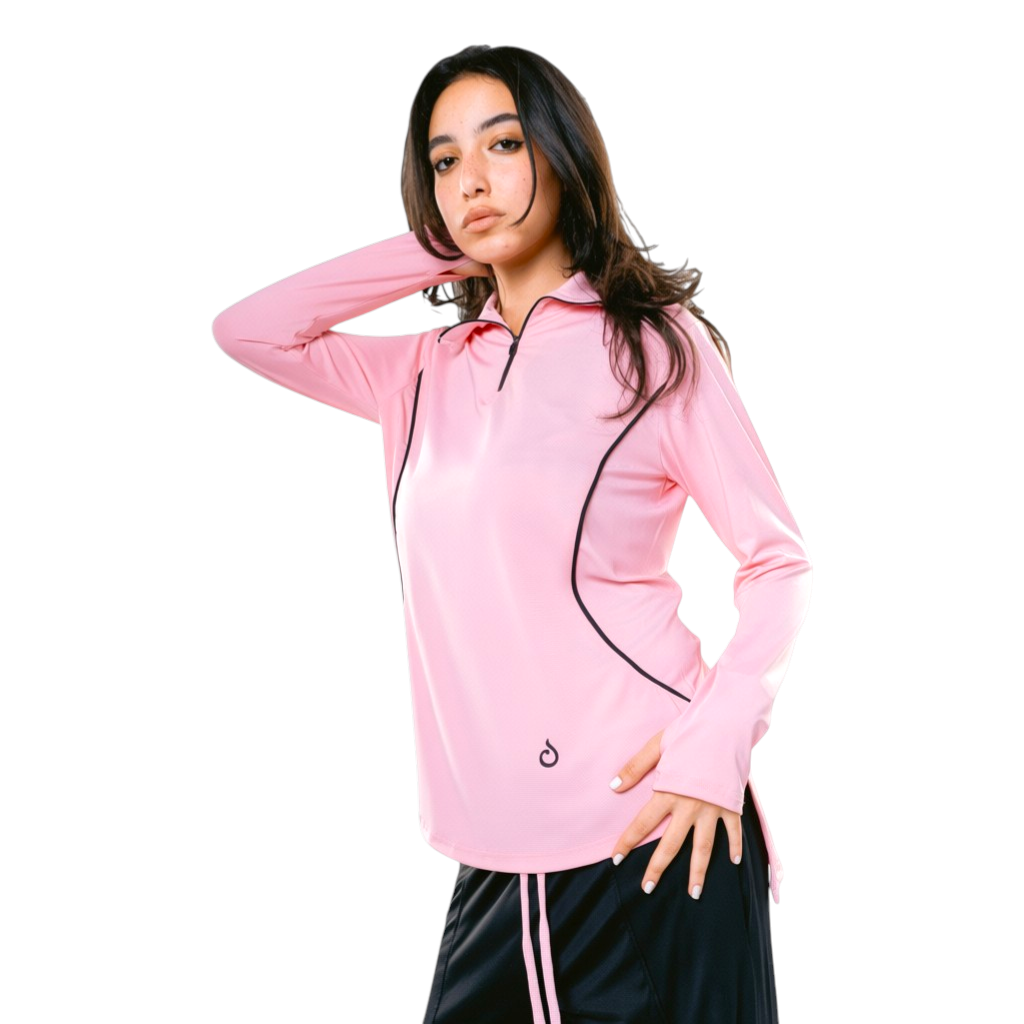 Meryia blush pink long sleeve zip top with black trim and subtle seam detailing, made from breathable fabric.