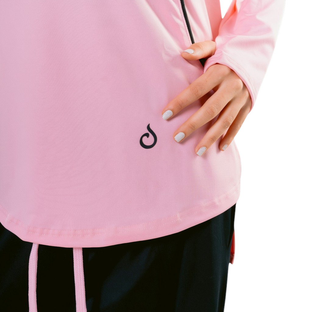 Meryia RASM Zip Top in blush pink, a lightweight, breathable fabric with a half-zip neckline and longline fit.